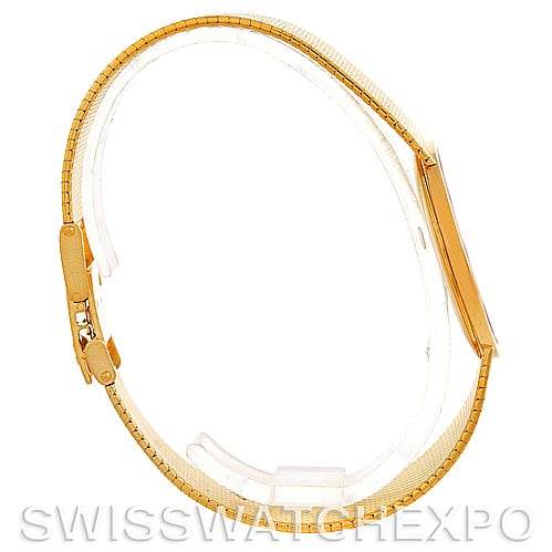 The image shows a side view of a Vintage Vacheron Constantin watch, highlighting its gold bracelet and slim case design.