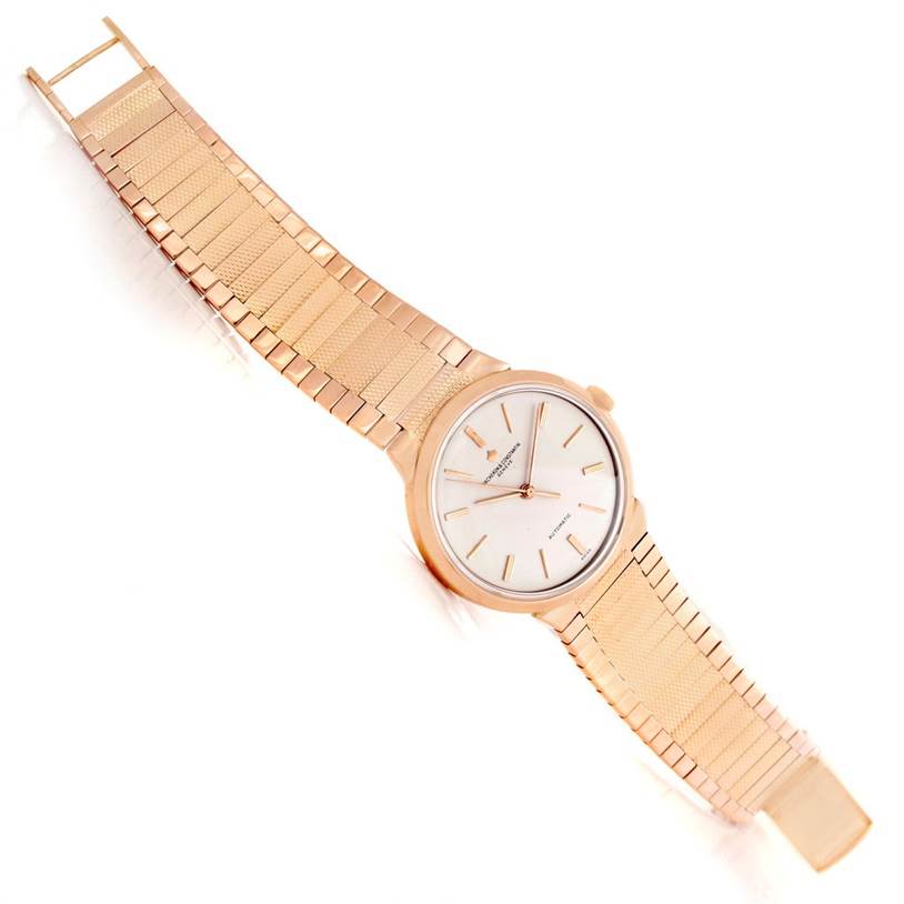 The image shows a vintage Vacheron Constantin watch from a straight-on angle, highlighting its gold case, dial, and bracelet.