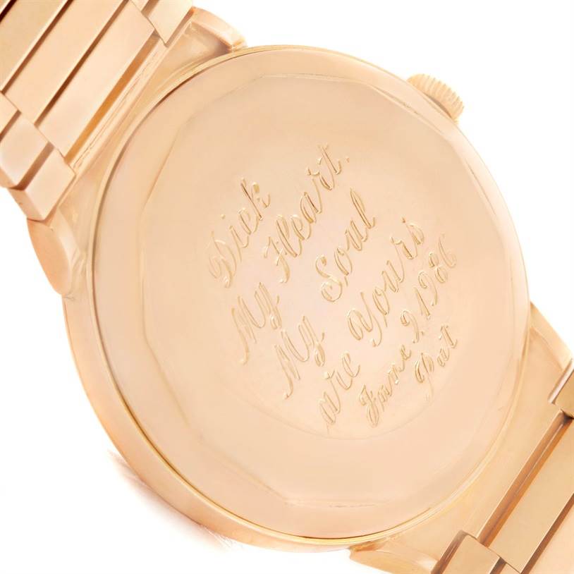 The image shows the engraved back and part of the bracelet of a Vintage Vacheron Constantin watch at an angle.