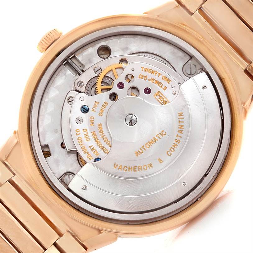 This image shows the back view of a Vintage Vacheron Constantin watch, highlighting its internal mechanisms and engravings.