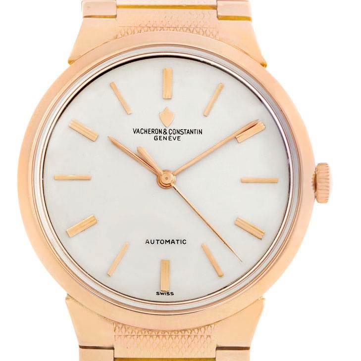The image shows a front view of a Vintage Vacheron Constantin watch, highlighting the dial, hands, and strap attachment.