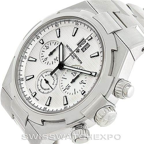 The image shows a Vacheron Constantin Overseas 49150 Men
s Stainless Steel Silver Dial 49150 Men
s Stainless Steel Silver Dial watch at an angled view, highlighting the dial, subdials, crown, and bracelet.