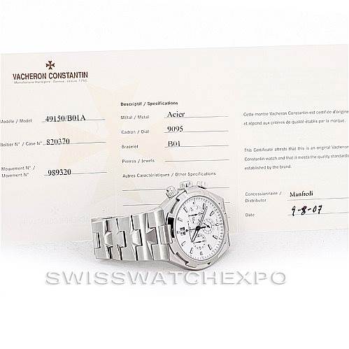 The Vacheron Constantin Overseas 49150 Men
s Stainless Steel Silver Dial 49150 Men
s Stainless Steel Silver Dial watch is shown from a front angle along with its certificate of Best Quality
ity in the background.