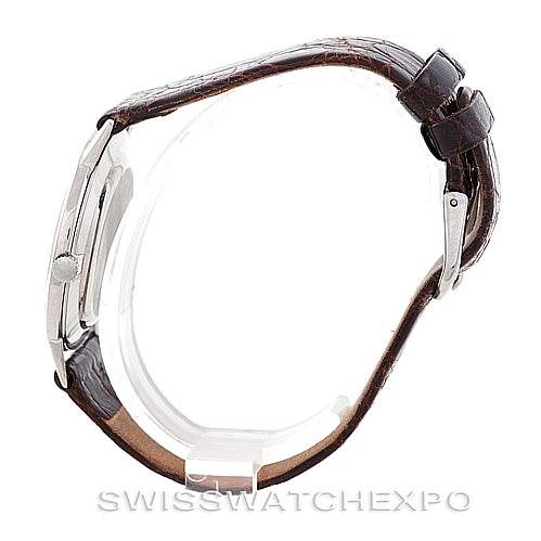 Side profile of a Vintage Vacheron Constantin watch displaying its brown leather strap, case, crown, and buckle.