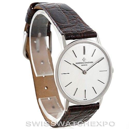 This image shows a Vacheron Constantin Vintage 7697 Men's White Gold Silver Dial 7697 Men's White Gold Silver Dial watch from a three-quarter angle, displaying the face, leather strap, and buckle.