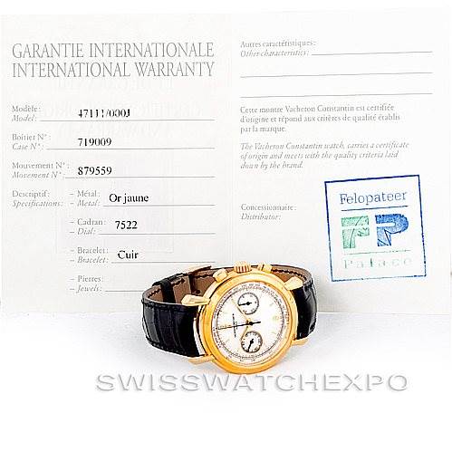 The image shows a Vacheron Constantin Historiques 47111 Men's Yellow Gold Silver Dial 47111 Men's Yellow Gold Silver Dial model watch placed at an angle, with its international warranty card visible.