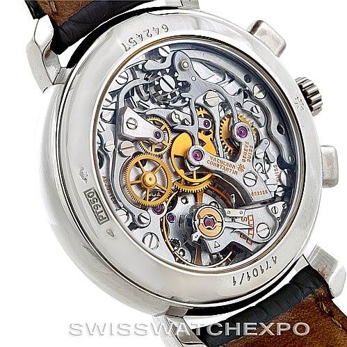 The image shows the back view of a Vacheron Constantin Historiques 47101 Men's Platinum Silver Dial 47101 Men's Platinum Silver Dial model watch, highlighting its complex mechanical movement.