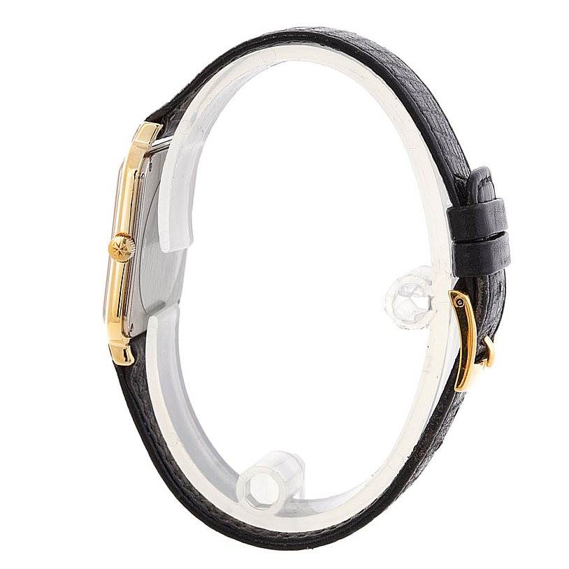 This image shows a side view of the Vintage Vacheron Constantin watch, highlighting the case, crown, and leather strap.