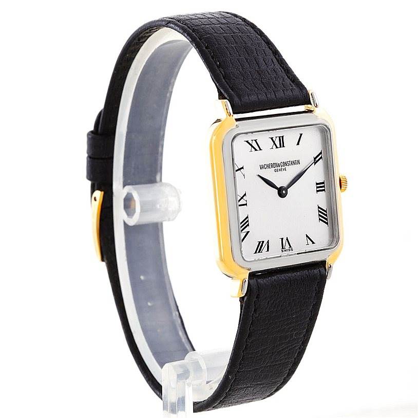 The image shows a side view of a Vintage Vacheron Constantin watch with a square gold case and a black leather strap.