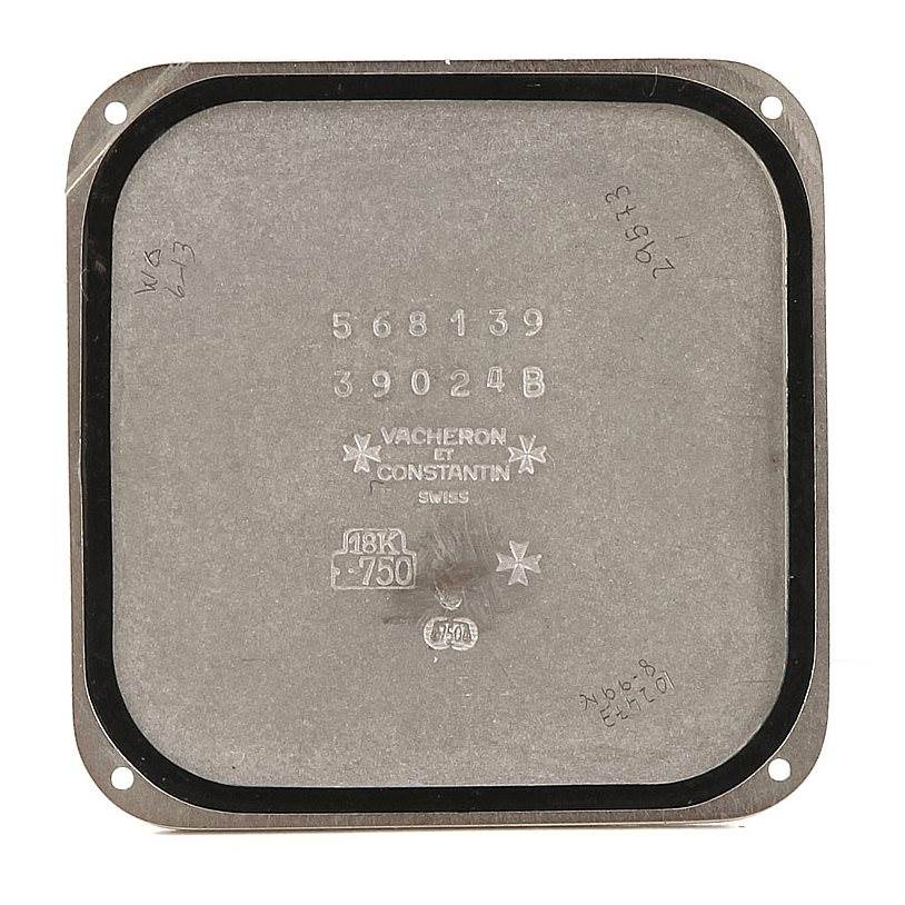 This image shows the case back of a Vintage Vacheron Constantin watch, displaying model numbers and the brand insignia.