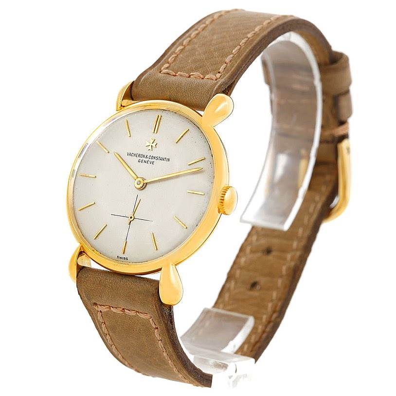 The image shows a Vacheron Constantin Vintage 4014 Men's Yellow Gold Silver Dial 4014 Men's Yellow Gold Silver Dial model watch at a slight angle highlighting its gold case, leather strap, and minimalist dial.