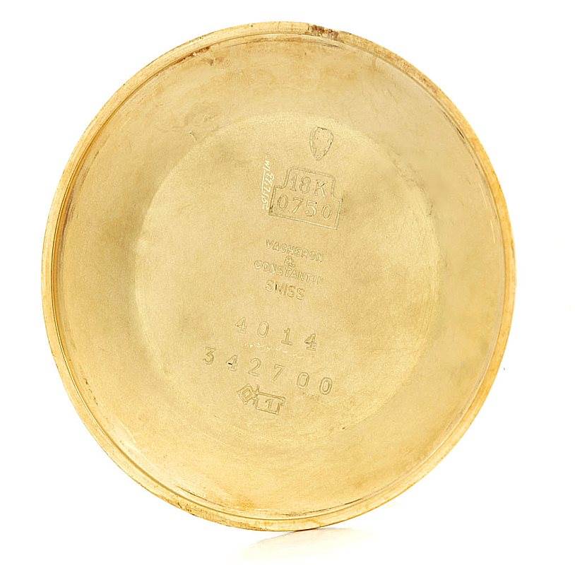 The image shows the interior of the watch case back of a Vintage Vacheron Constantin model, displaying its engravings and hallmarks.