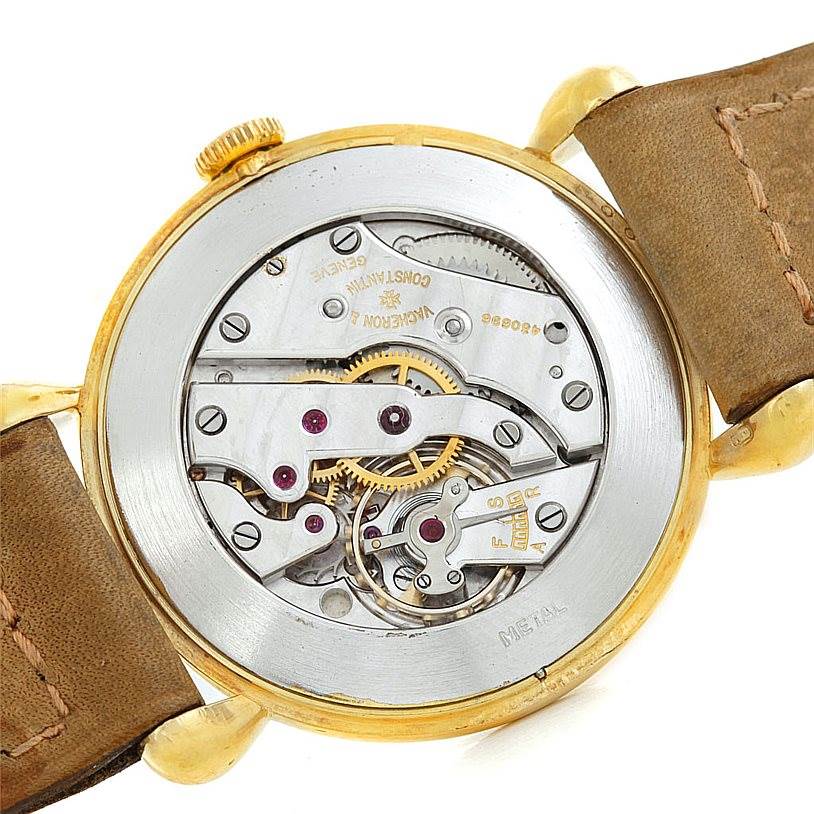 The image shows the inner mechanical movement of a Vintage Vacheron Constantin watch from the back side.