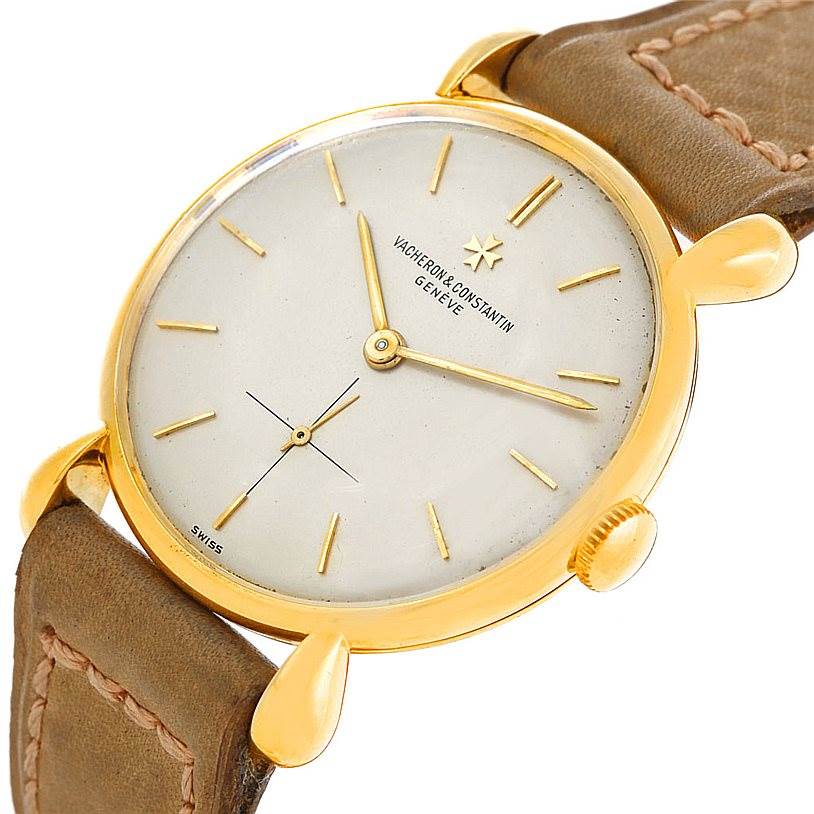 This image shows a close-up of a Vintage Vacheron Constantin watch from an angled viewpoint, highlighting the face, dial, crown, and strap.