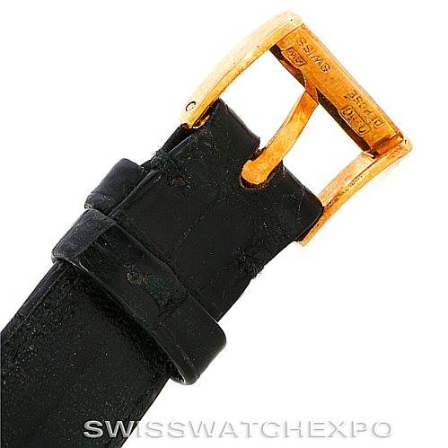 This image shows the gold buckle and black leather strap of a Vintage Vacheron Constantin watch from a top angle.