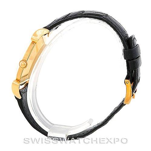 The image shows a side view of a Vintage Vacheron Constantin watch, highlighting the black leather strap and the gold case.