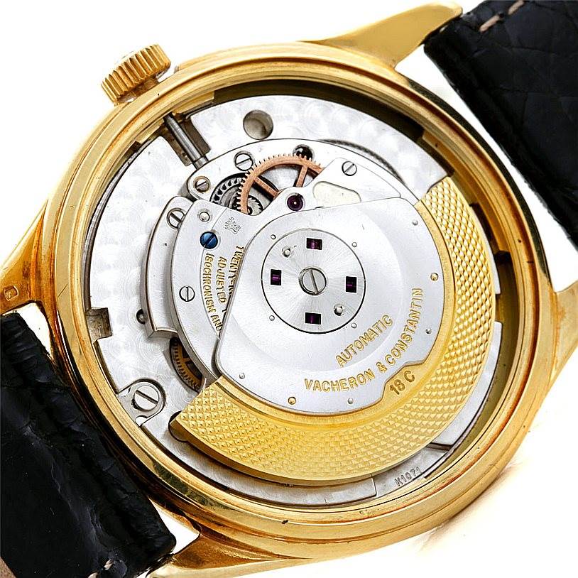 The image shows the back view of a Vintage Vacheron Constantin watch, highlighting its automatic movement and internal mechanism.