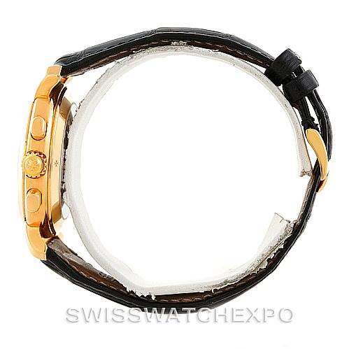 This image shows a side view of the Vacheron Constantin Historiques 47101/4 Men's Yellow Gold Black Dial 47101/4 Men's Yellow Gold Black Dial watch, highlighting the crown, pushers, and part of the leather strap.