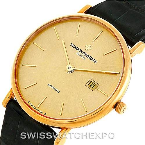 This Vacheron Constantin Vintage 48002 Men
s Yellow Gold Champagne Dial 48002 Men
s Yellow Gold Champagne Dial watch is shown from an angled top-down view, highlighting the gold dial, hands, and black leather strap.