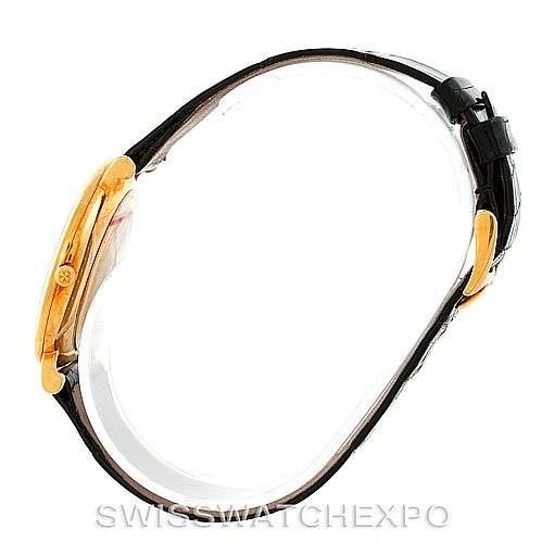 The image shows a side profile of a Vintage Vacheron Constantin watch, highlighting its gold case and black leather strap.