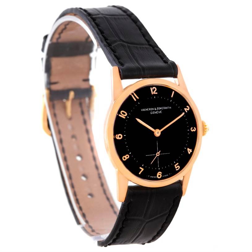 The image features a Vacheron Constantin Vintage Men's Rose Gold Black Dial Men's Rose Gold Black Dial watch at a slight angle showing the black dial, gold case, and black leather strap.