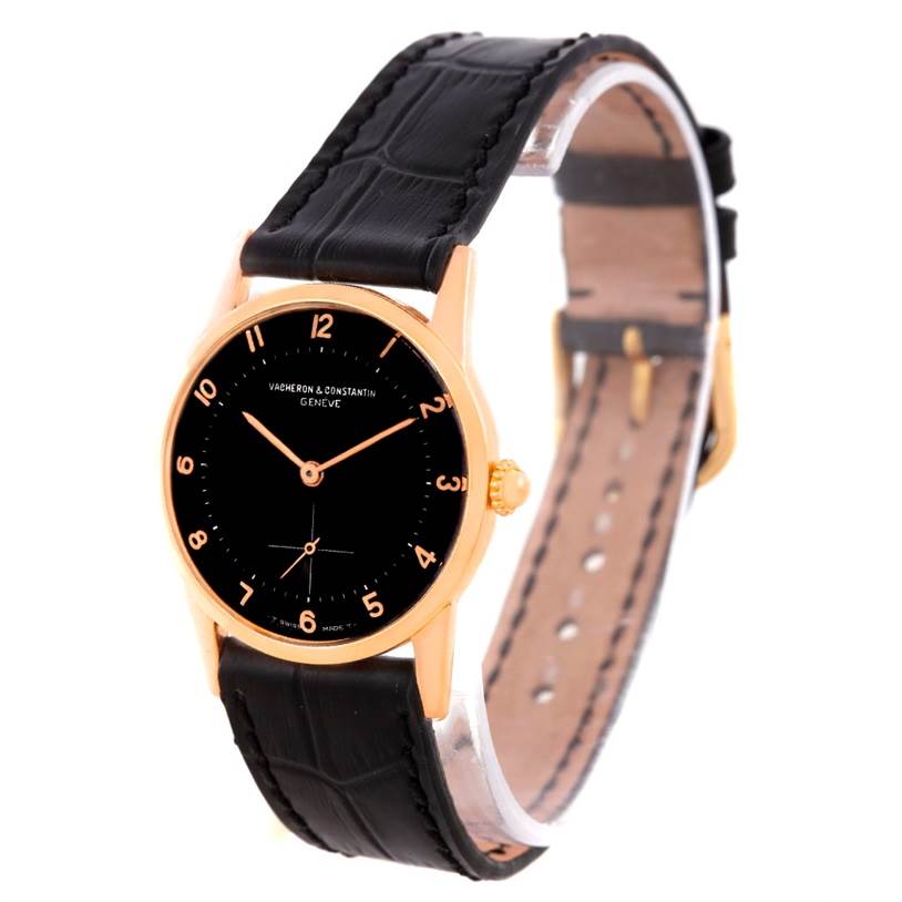 The Vacheron Constantin Vintage Men's Rose Gold Black Dial Men's Rose Gold Black Dial watch is shown at an angle displaying its black dial, gold case, and black leather strap.