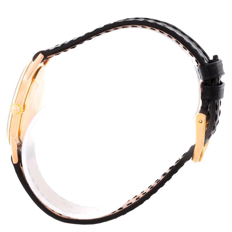 The image shows a side view of a Vintage Vacheron Constantin watch, highlighting the strap, case, and crown.