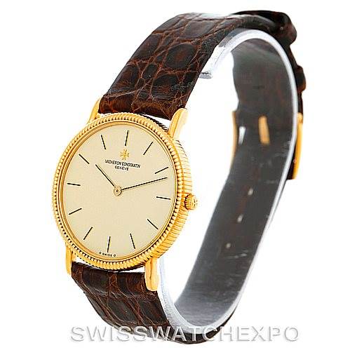The image shows a side and top view of a Vacheron Constantin Vintage 33076 Men's Yellow Gold Beige Dial 33076 Men's Yellow Gold Beige Dial watch with a brown leather strap and gold case.