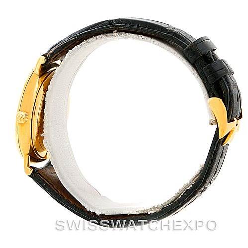 This image shows the side view and clasp of a Vintage Vacheron Constantin watch, highlighting the gold case and black leather strap.