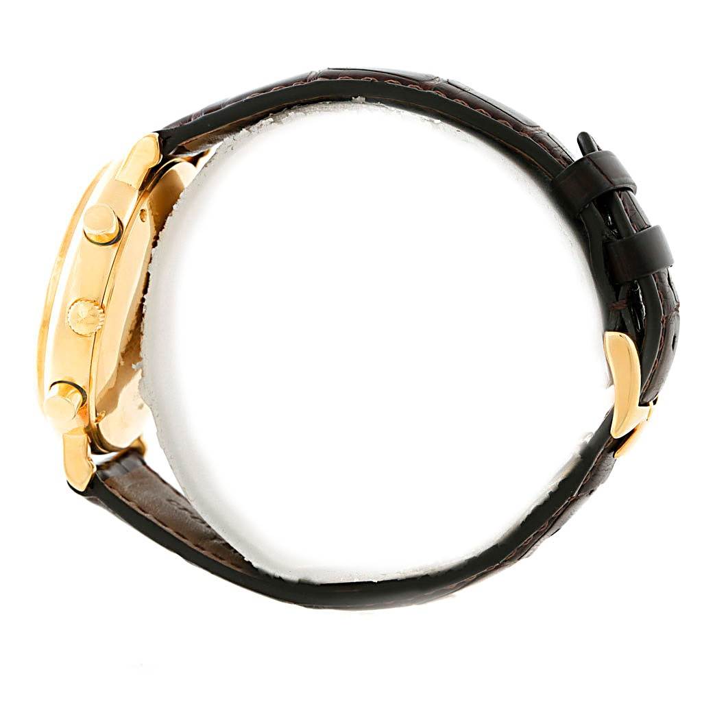 A side view of the Vintage Vacheron Constantin watch showing the crown, pushers, and leather strap.