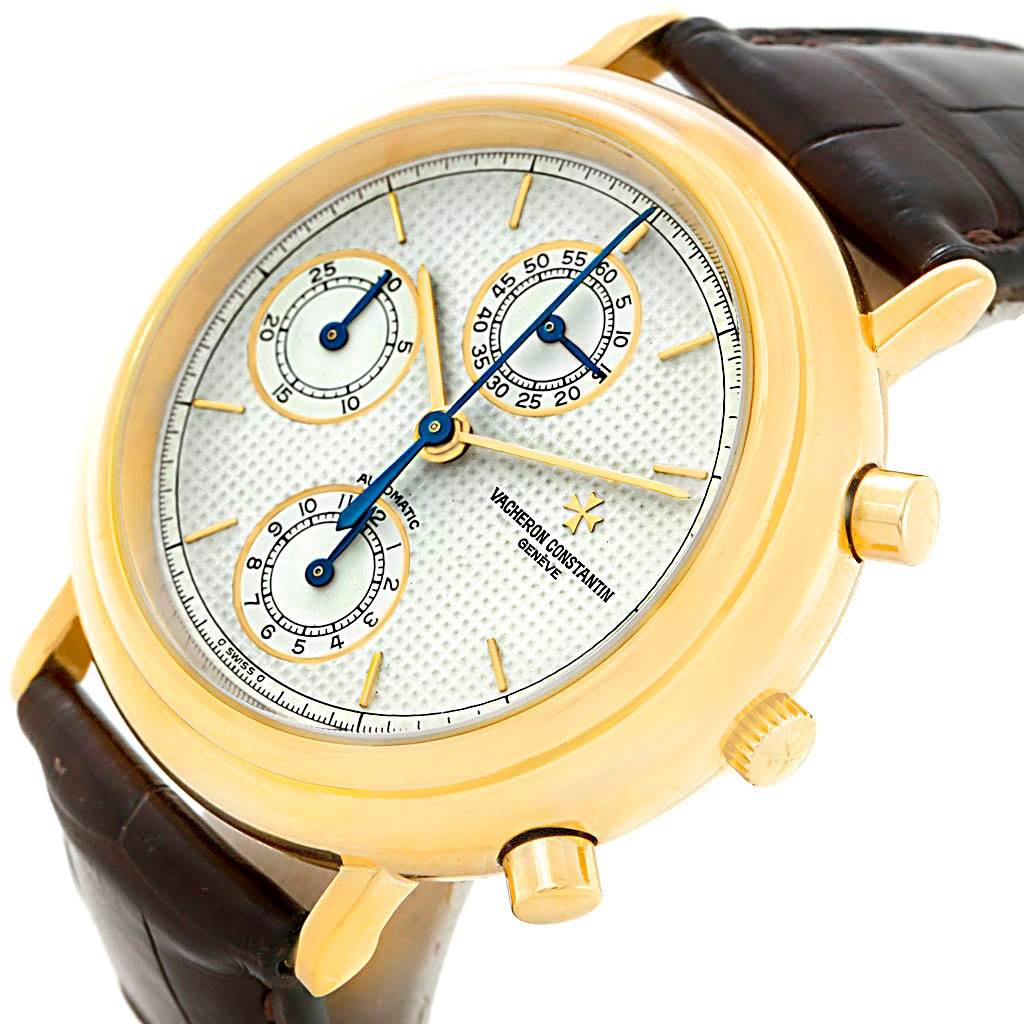 The image shows a Vacheron Constantin Vintage 47001 Men's Yellow Gold White Dial 47001 Men's Yellow Gold White Dial model watch at a three-quarter angle, displaying the dial, chronograph sub-dials, and crown.