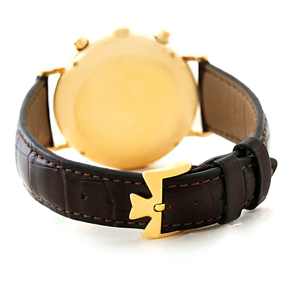 The image shows the rear side and leather strap of a Vintage Vacheron Constantin watch, highlighting the gold buckle and case back.