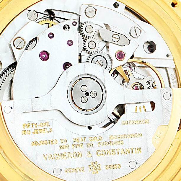 This image shows the intricate inner mechanism of a Vintage Vacheron Constantin watch, highlighting gears, jewels, and engravings.