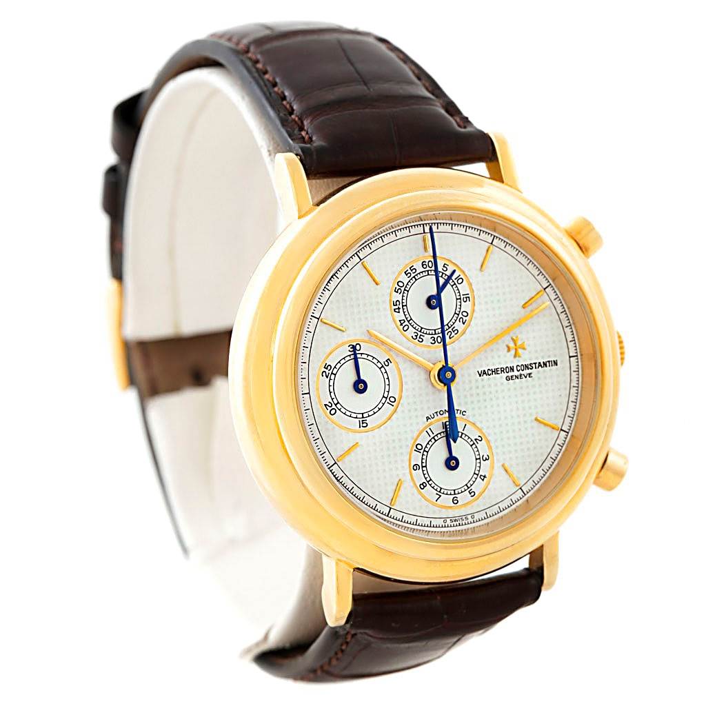 This image shows a Vacheron Constantin Vintage 47001 Men's Yellow Gold White Dial 47001 Men's Yellow Gold White Dial model watch at a three-quarter angle, highlighting its face, gold case, and brown leather strap.