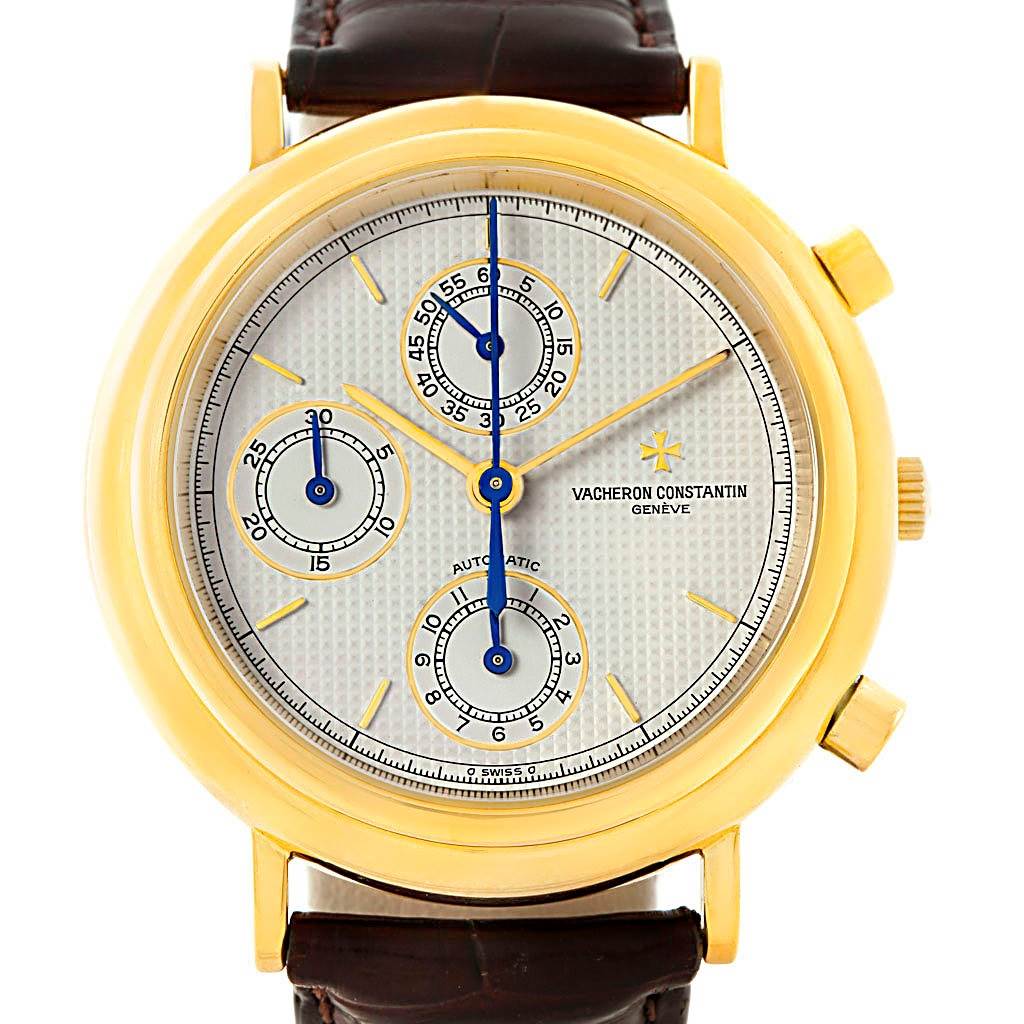 This is a frontal view of a Vintage Vacheron Constantin watch showing its gold case, three sub-dials, and leather strap.