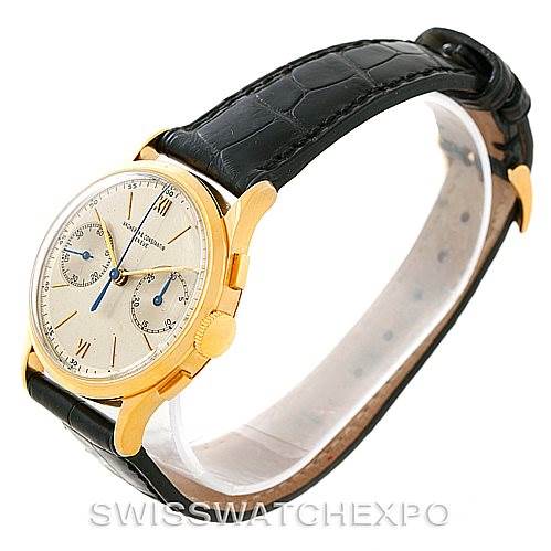 The image shows a side angle view of a Vintage Vacheron Constantin watch, highlighting its gold case, dial, and black leather strap.