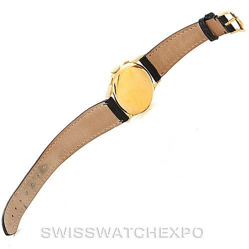 This image shows the back and strap of a Vintage Vacheron Constantin watch, laid out flat with the dial facing down.