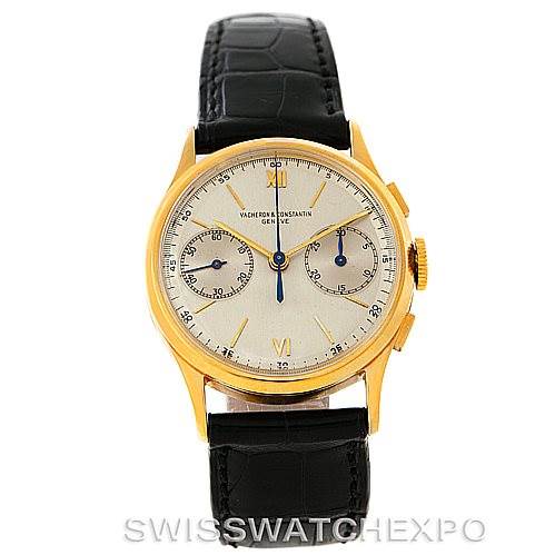 The image shows a front view of a Vintage Vacheron Constantin watch with a gold case, black leather strap, and white dial with subdials.