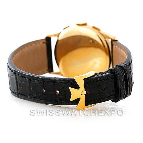 This image shows the back angle of a Vintage Vacheron Constantin watch, highlighting the black leather strap and distinctive buckle.