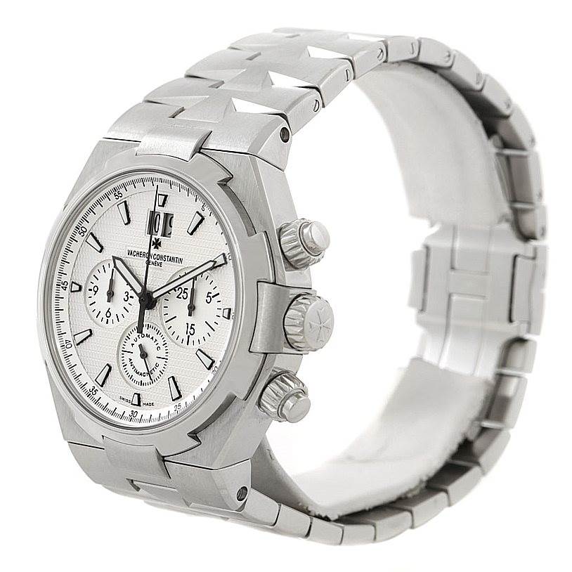The Vacheron Constantin Overseas 49150 Men's Stainless Steel Silver Dial 49150 Men's Stainless Steel Silver Dial watch is shown at a three-quarter angle, highlighting its dial, bezel, and bracelet.