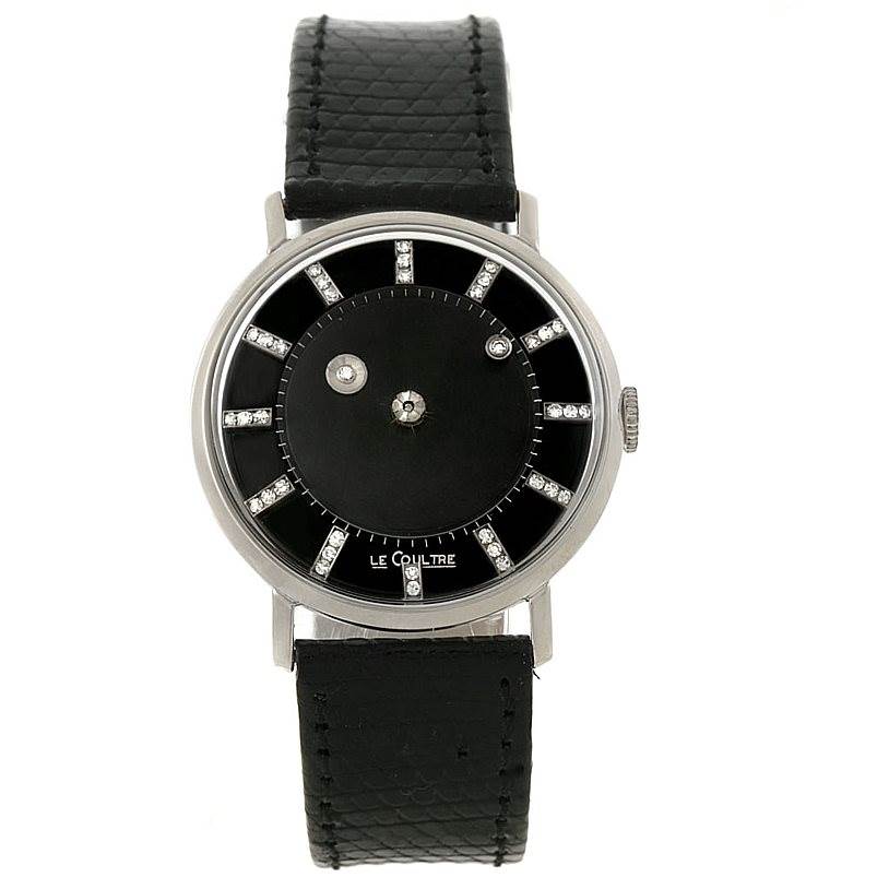The image shows a front view of a Vintage Vacheron Constantin watch with a black leather strap and a black dial.