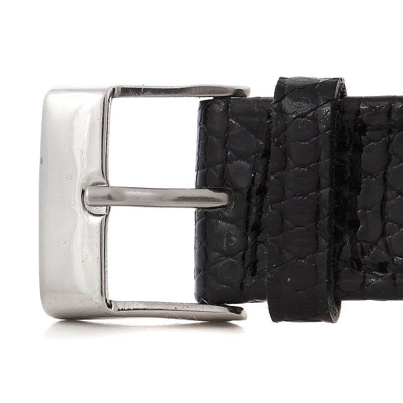This image shows a close-up of the buckle and part of the black leather strap from a Vintage Vacheron Constantin watch.