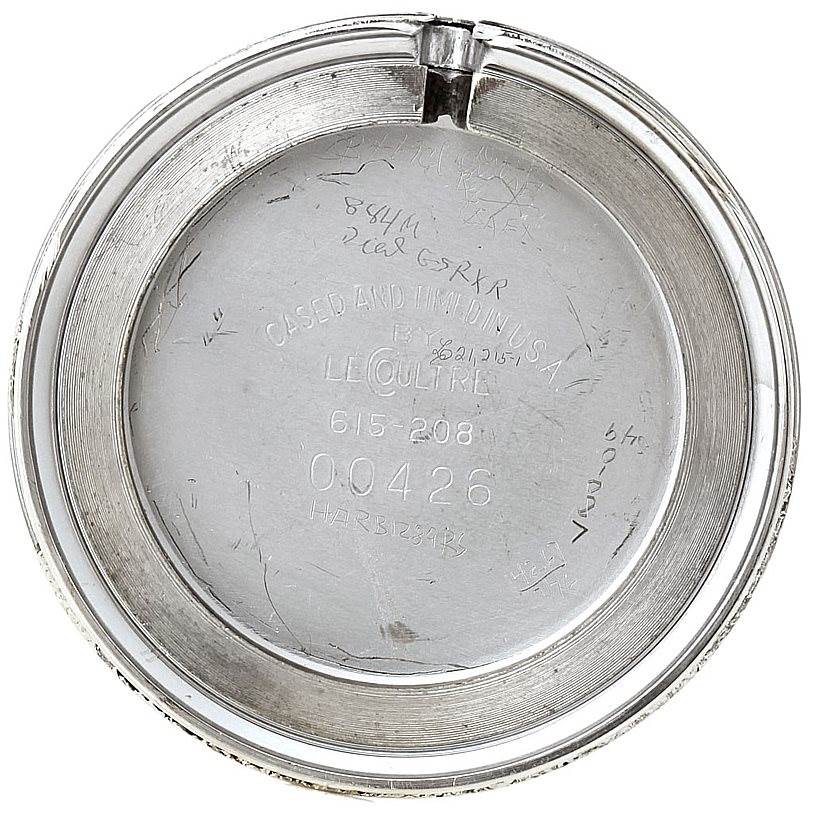 This image shows the inside of the case back of a Vintage Vacheron Constantin watch, displaying various engravings and markings.