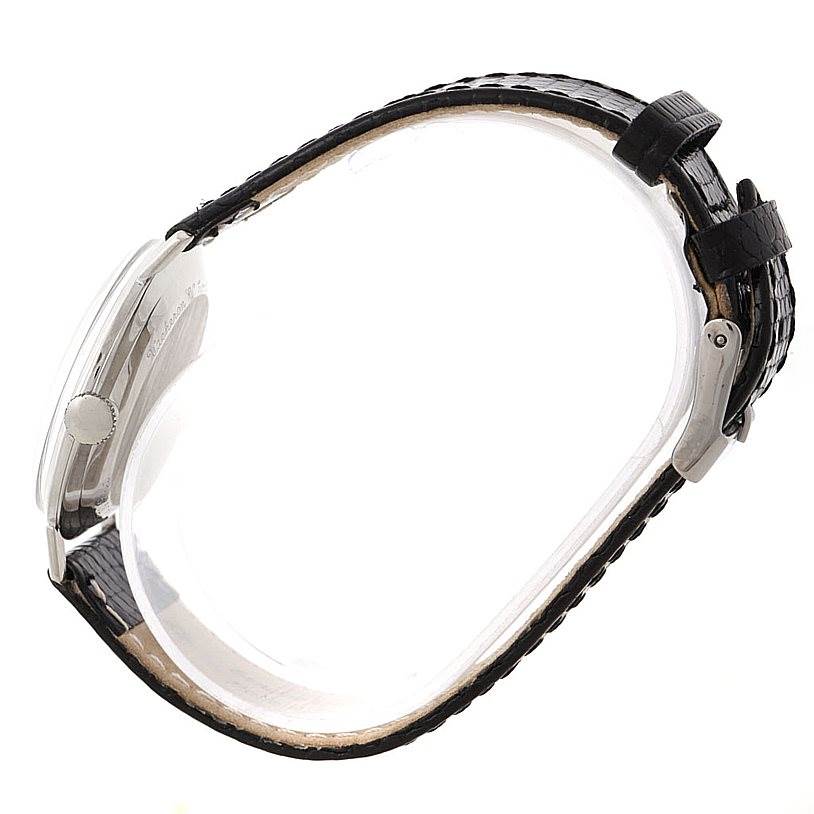 This image shows a side view of the Vacheron Constantin Vintage White Gold Black Dial White Gold Black Dial watch, highlighting the crown, case, and leather strap.