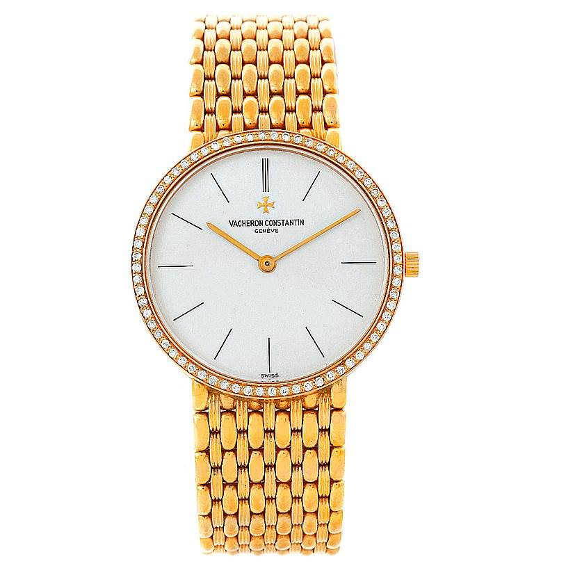 The image shows a front-facing view of a Vintage Vacheron Constantin watch, highlighting its dial, bezel with diamonds, and gold bracelet.