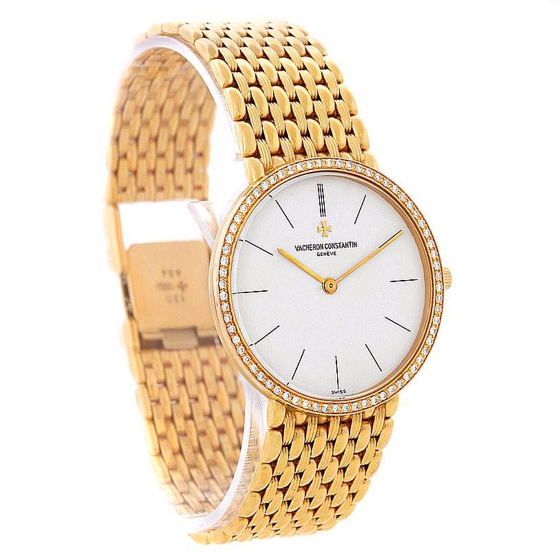 The image shows a Vacheron Constantin Vintage 33593 Men's Yellow Gold White Dial 33593 Men's Yellow Gold White Dial watch in a semi-side angle, highlighting the golden bracelet and the diamond-studded bezel.
