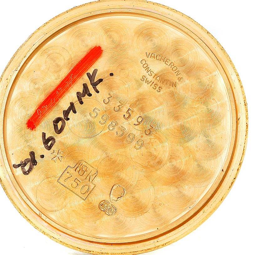 This is the inside case back of a Vintage Vacheron Constantin watch, displaying inscriptions, markings, and hallmarks.