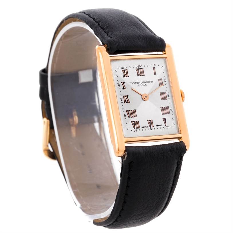 This image shows a Vacheron Constantin Vintage Men's Rose Gold Silver Dial Men's Rose Gold Silver Dial watch at a three-quarter angle, displaying its rectangular dial, Roman numerals, and black leather strap.