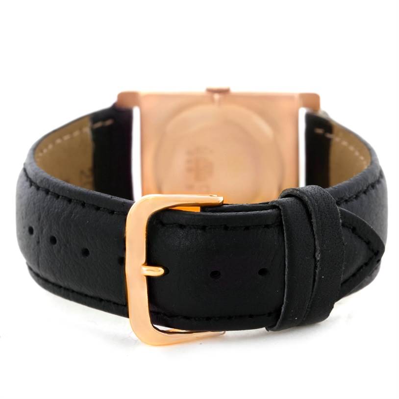 The image shows the back of a Vintage Vacheron Constantin watch, focusing on the black leather strap and rose gold buckle.