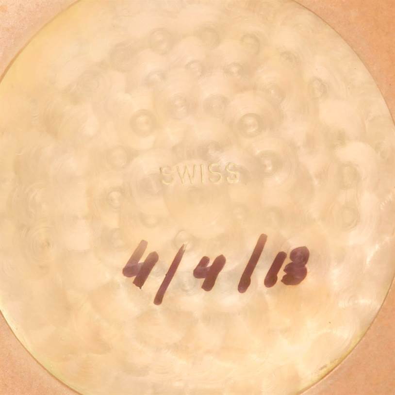 The image shows the interior case back of a Vintage Vacheron Constantin watch, marked "SWISS" with handwritten numbers "4/4/18".